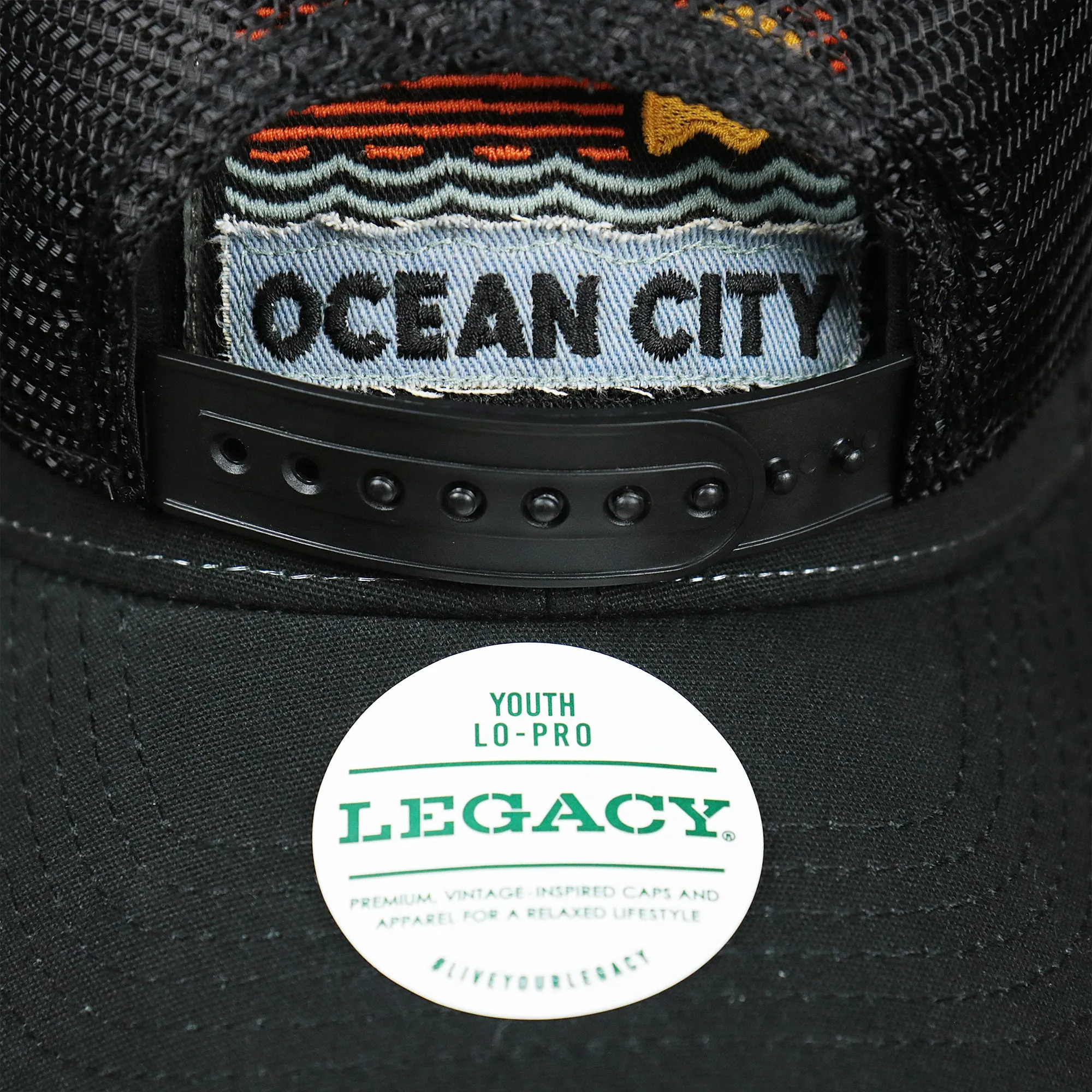 Youth New Jersey Ocean City Sunset Mesh Back Trucker Hat | Black And Black Mesh Youth Trucker Hat